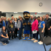 Group photo of SOE Dean's Circle with Scotty the mascot