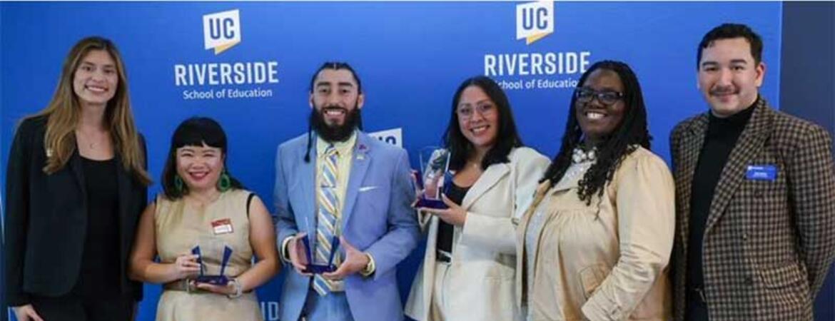 Four Alumni honored