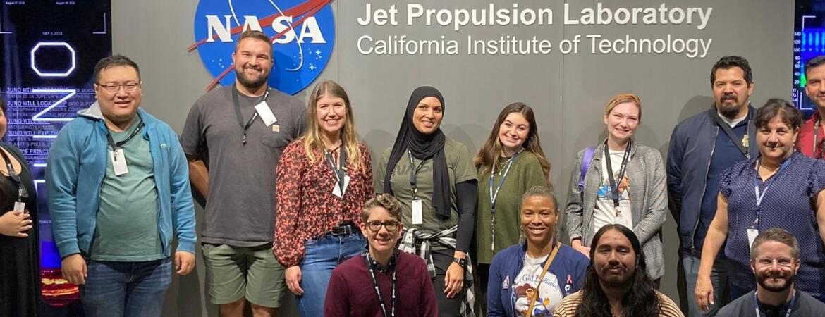 Group of educators in front of NASA JPL sign