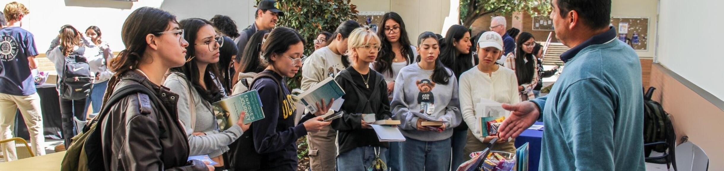 Dr. Miguel Zavala with students