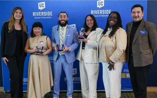Four Alumni honored