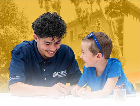 a student teacher working with a child