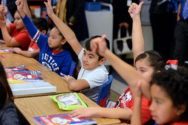children in a class, raising their hands 600x400 children in a class, raising their hands